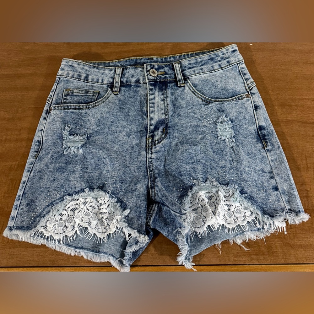Women’s Blue Distressed Denim Shorts with White Lace Trim
